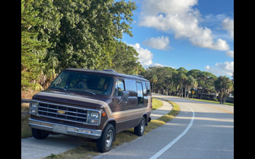 van parked on sidewalk at desoto preserver