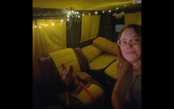 jen in the van at night with tigs